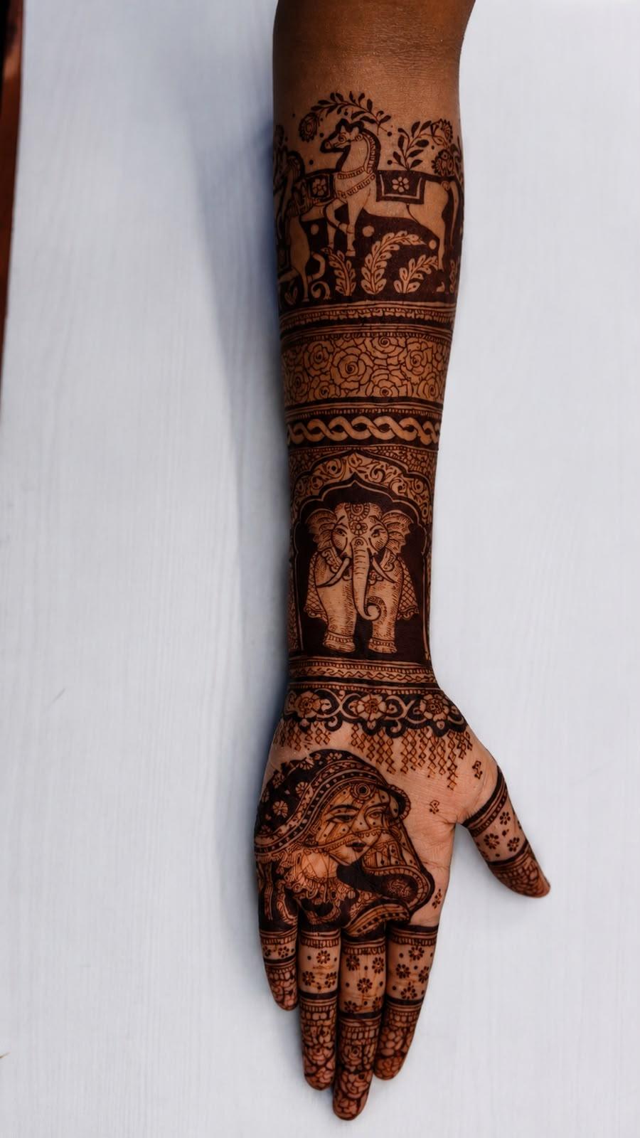 Deeply stained bridal arm with horse and bride face