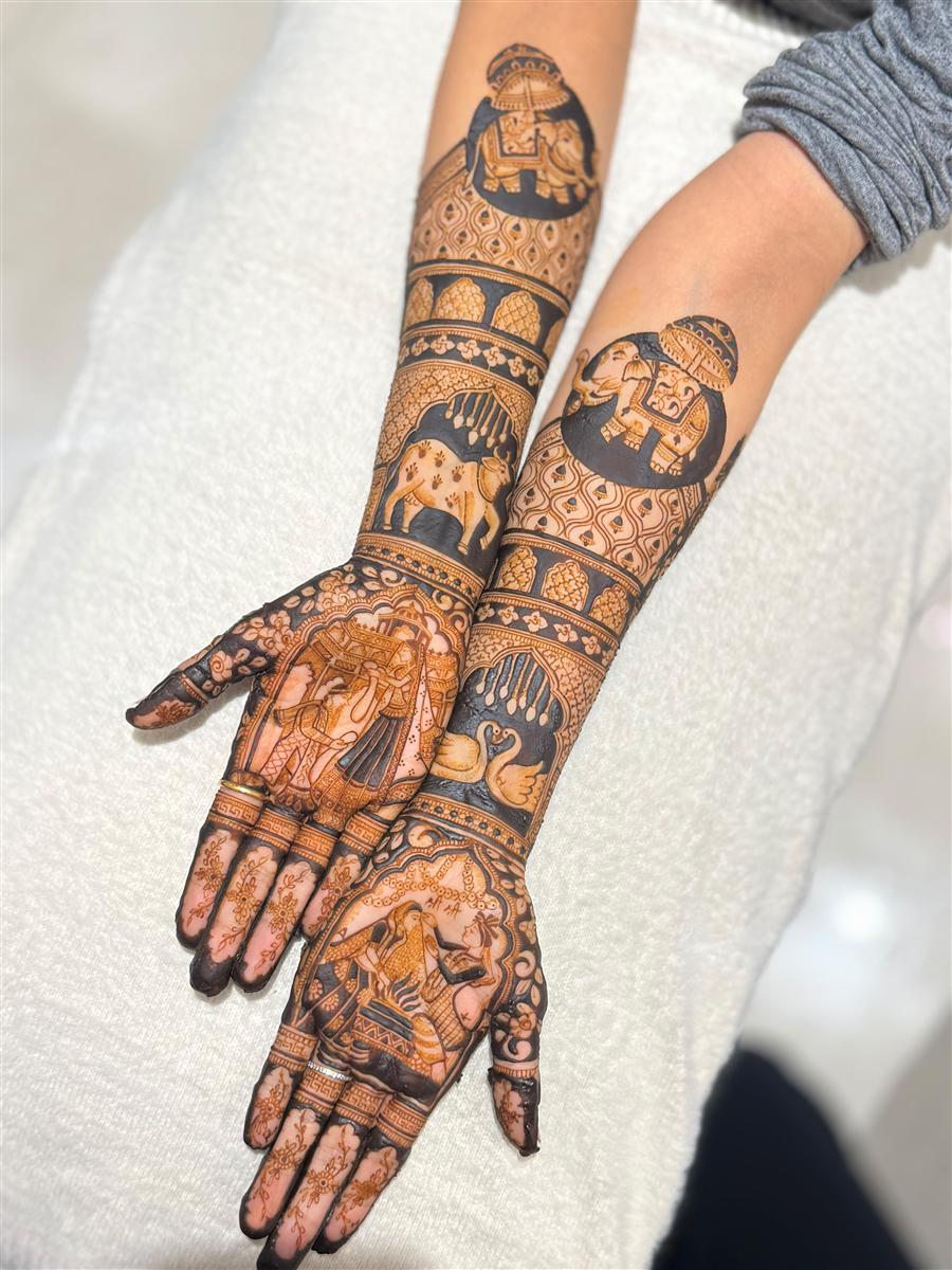 Bridal arms with elephants and swans