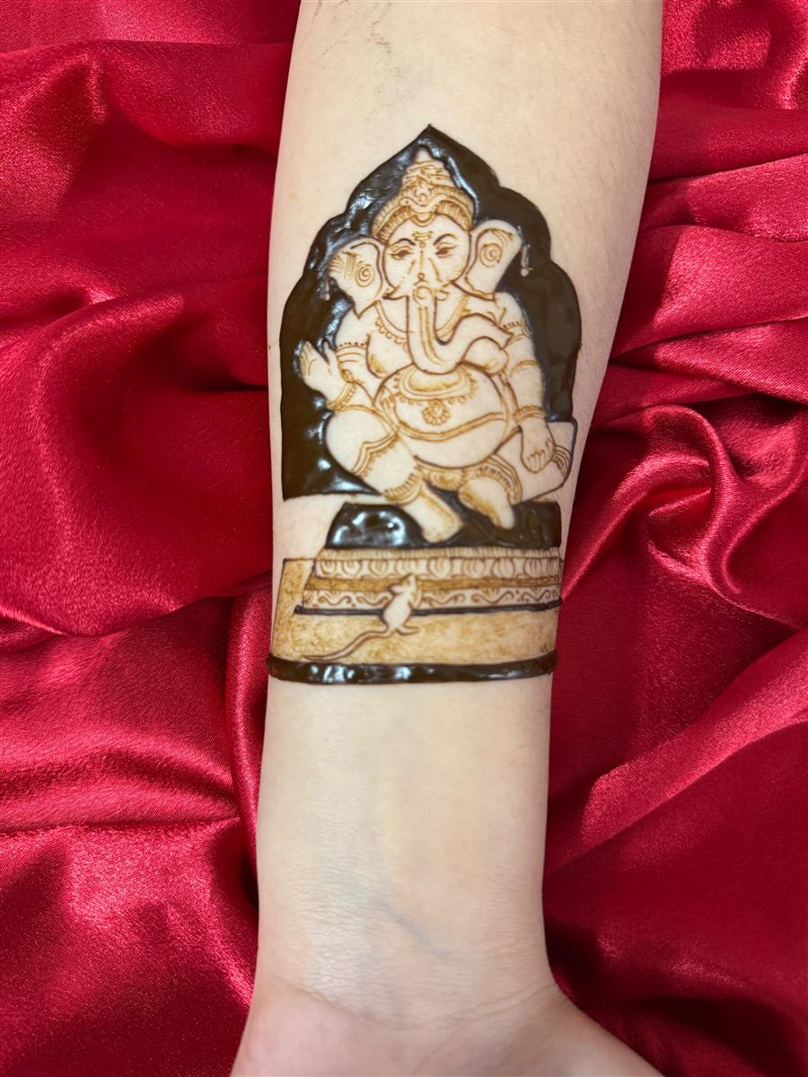 Ganesh armband design on red silk