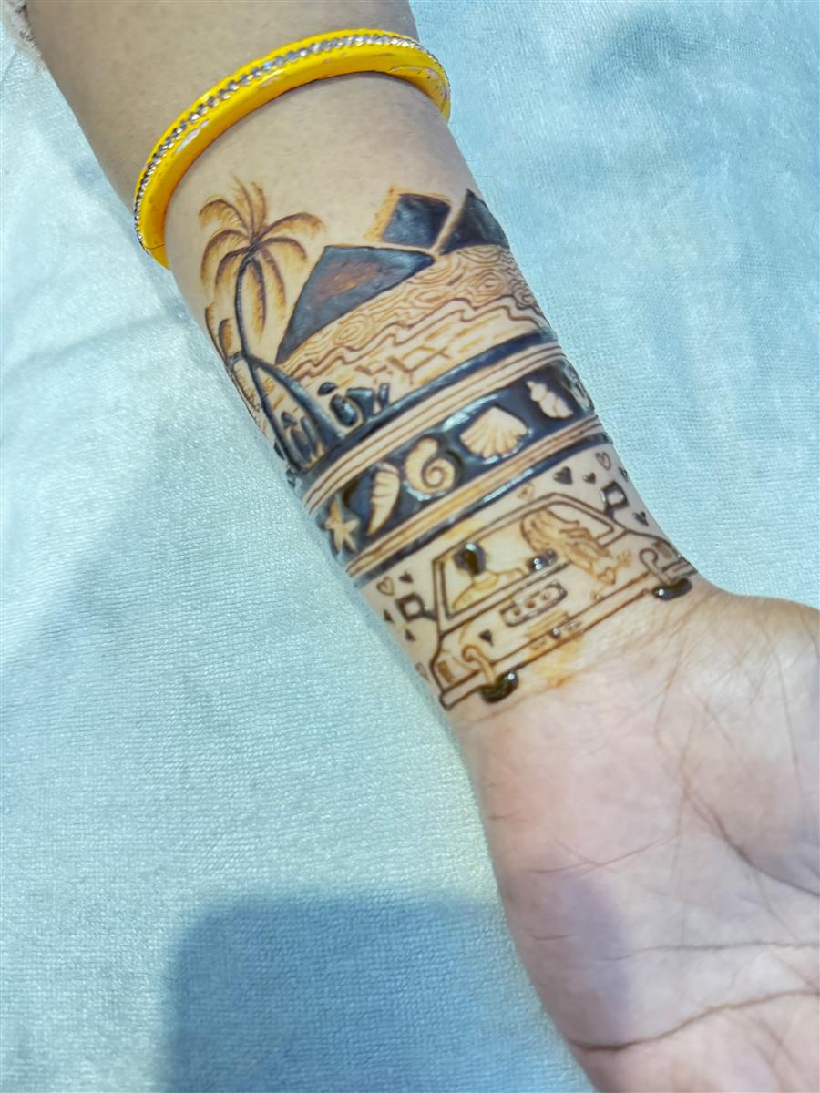 Beach and travel themed wristband mehandi